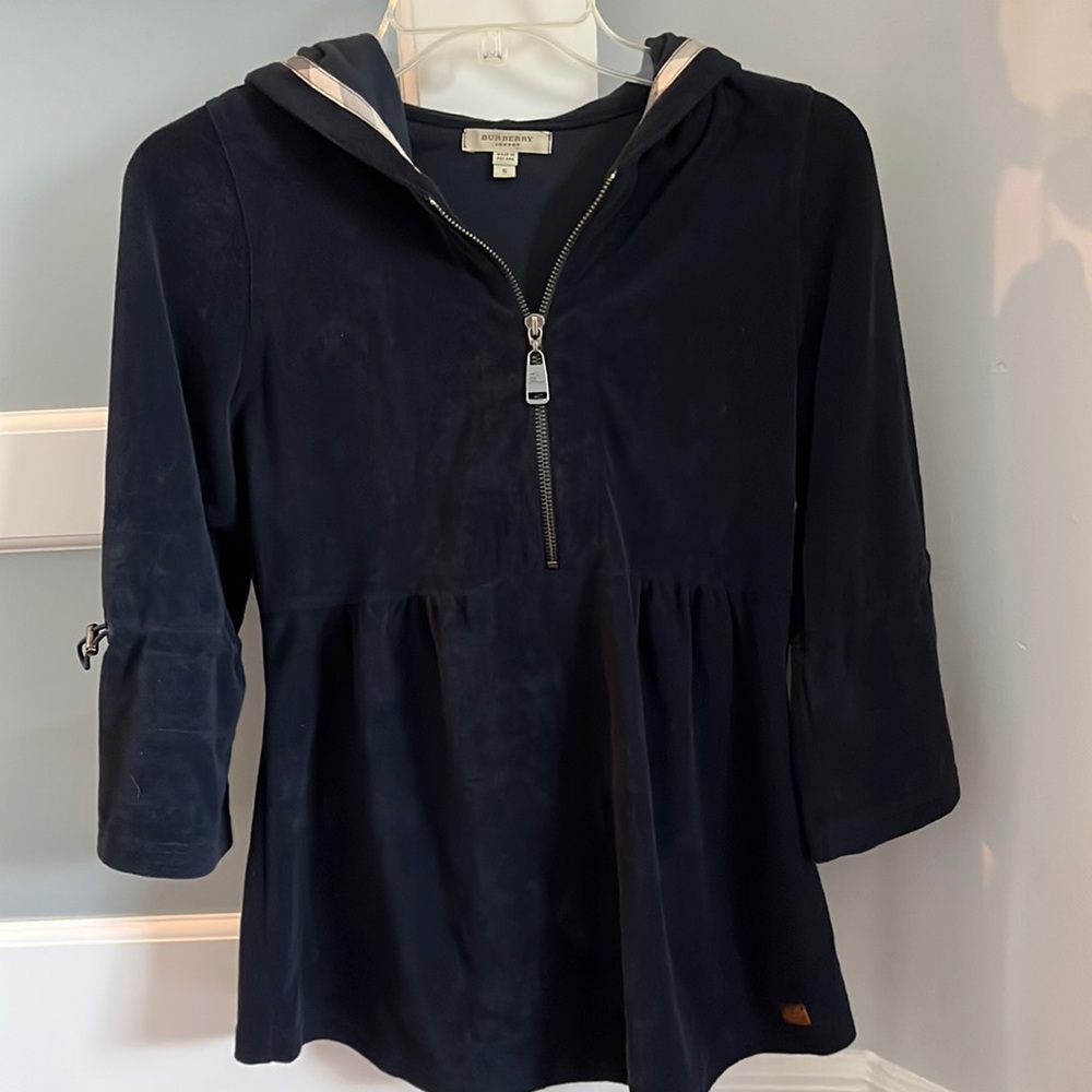 Burberry blue terrycloth hoodie with flared adjustable bell sleeves.